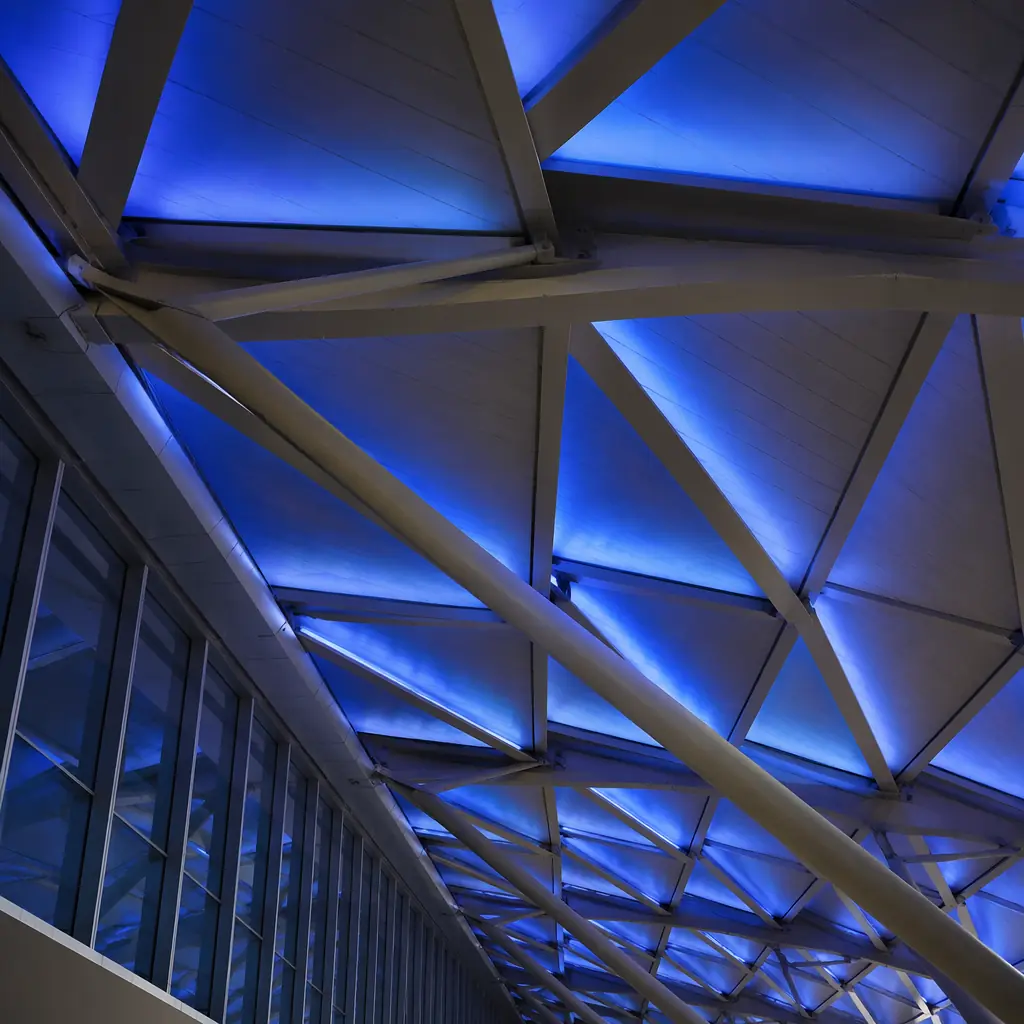 Abstract architectural perspective of terminal ceiling with geometric light patterns